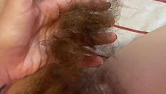 Intense Close-Up Of A Girl Shaving Her Long Pussy Hair