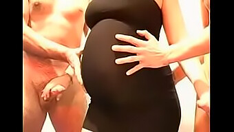 Bukakke With A Pregnant Woman In A Black Dress