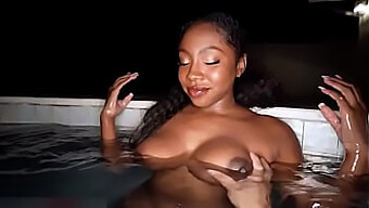 Black Beauty Enjoys Poolside Pleasure With Her Big Ass And Tits